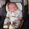 newborn, baby, sleeping, onesie, cartoon_prints, car_seat, cushion, blanket, infant, cute, peaceful, indoors, child, soft, resting, sleep, person, wearing, footed_pajamas, head