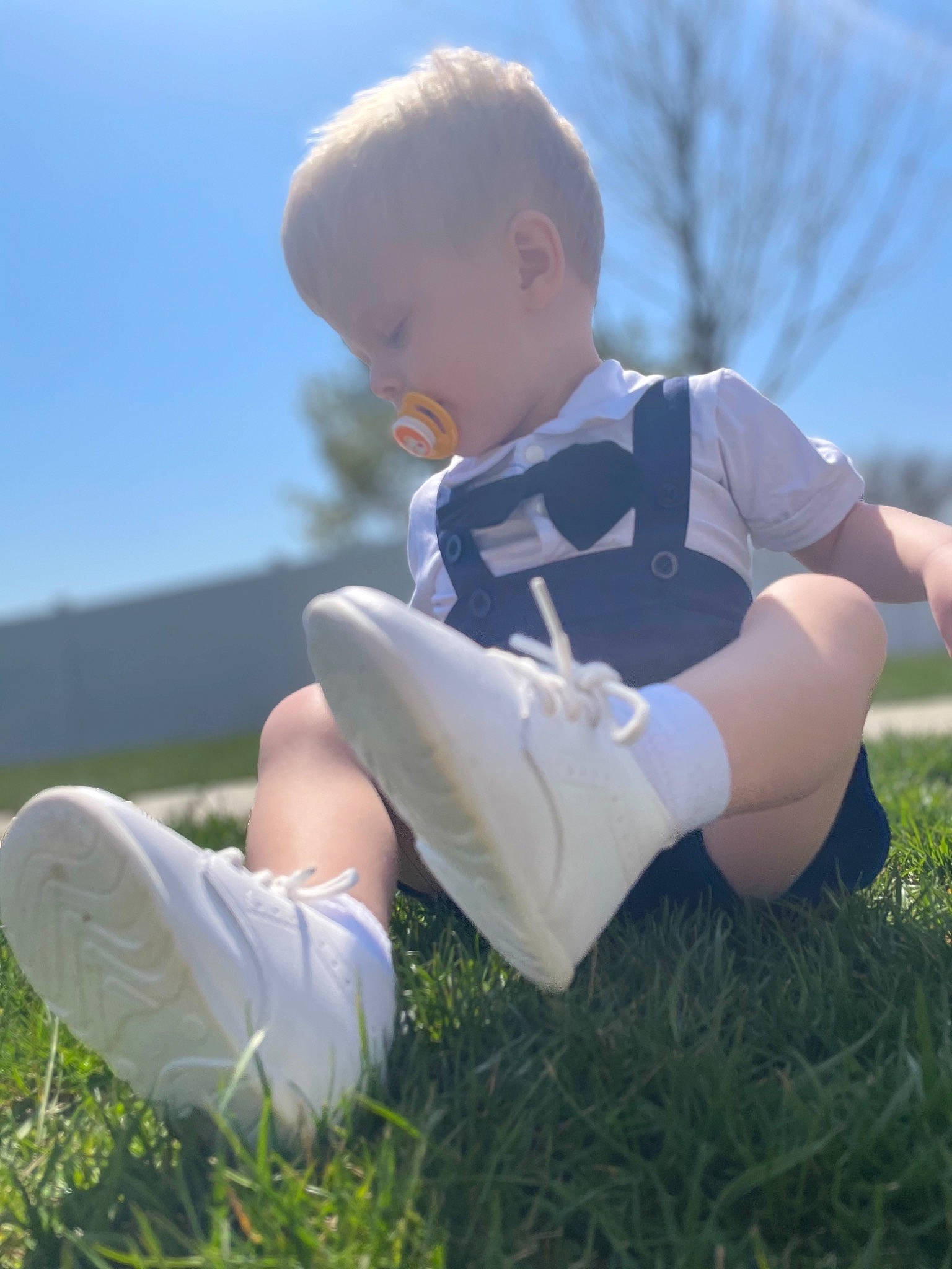 Zayland joined the competition — help win amazing prizes! arm, barefoot, gesture, grass, happy, head, human_body, joint, knee, leg, leisure, mammal, natural_environment, people_in_nature, person, plant, shorts, sky, sunglasses, sunlight