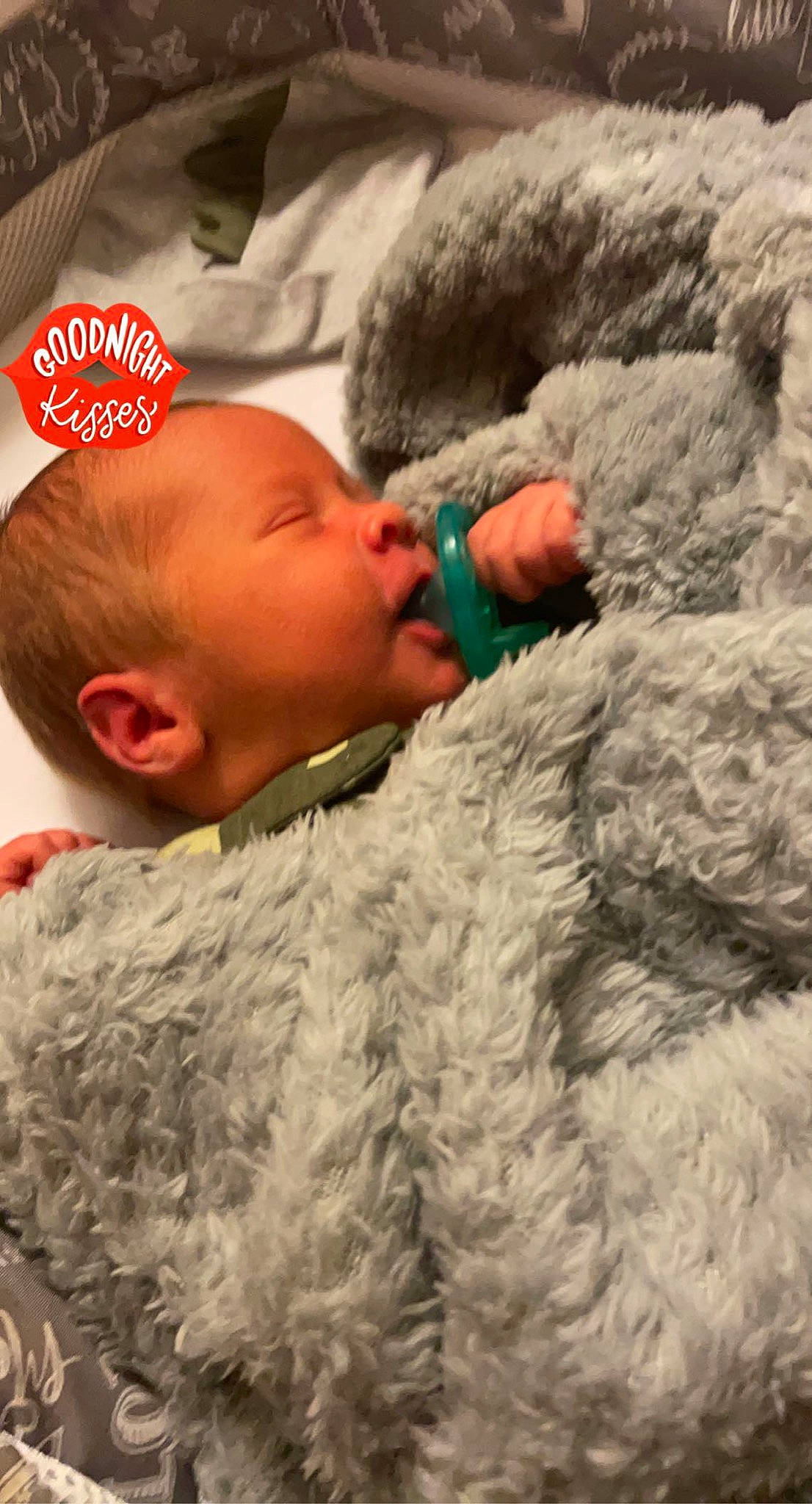 Zayden is registered to the contest to win money with this photo: baby, baby_toddler_clothing, cap, child, comfort, fur, fur_clothing, hairstyle, human, linens, mammal, military_camouflage, nose, person, skin, stuffed_toy, textile, toddler, vertebrate, wool