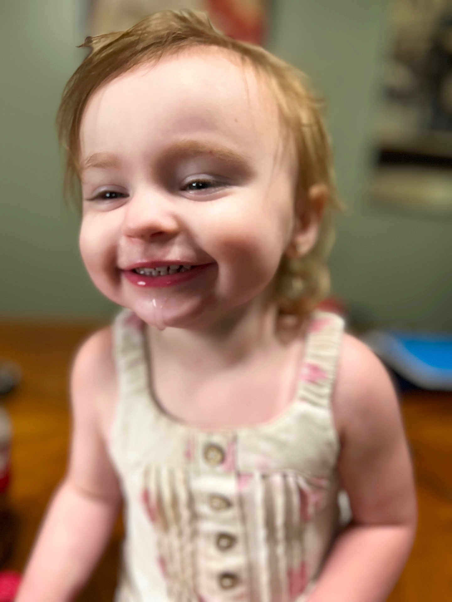 Bailey May joined the competition — help win amazing prizes! toddler, child, smiling, drool, dress, buttoned, indoor, blurry_background, happy, face, person, cute, messy_hair, skin, young_child, portrait, infant, baby, closeup, warm_lighting