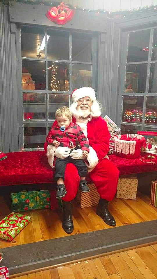 Blake joined the competition — help win amazing prizes! christmas, christmas_eve, christmas_stocking, fictional_character, headwear, holiday, joy, lap, person, santa_claus