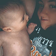 Paislee joined the competition — help win amazing prizes! baby, infant, adult, parent, mother, face, smiling, closeup, portrait, candid, indoor, affection, family, bonding, skin, diaper, fist, nose_touch, dim_lighting, photography