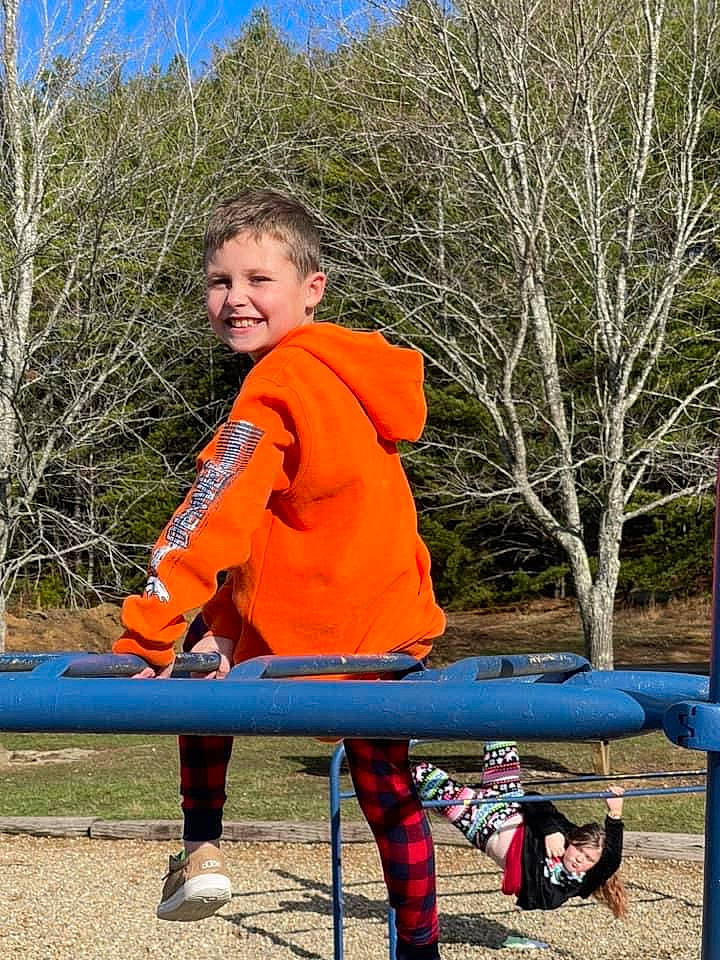 Cayden joined the competition — help win amazing prizes! autumn, child, electric_blue, fun, grass, human_leg, joy, knee, lap, leisure, outdoor_play_equipment, people_in_nature, person, plant, play, recreation, sitting, sky, sleeve, soil