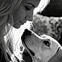 affection, animal, black_and_white, close_up, compassion, dog, eyes, face, fur, hair, human, indoor, intimate, love, nose, pet, portrait, profile, soft_light, woman