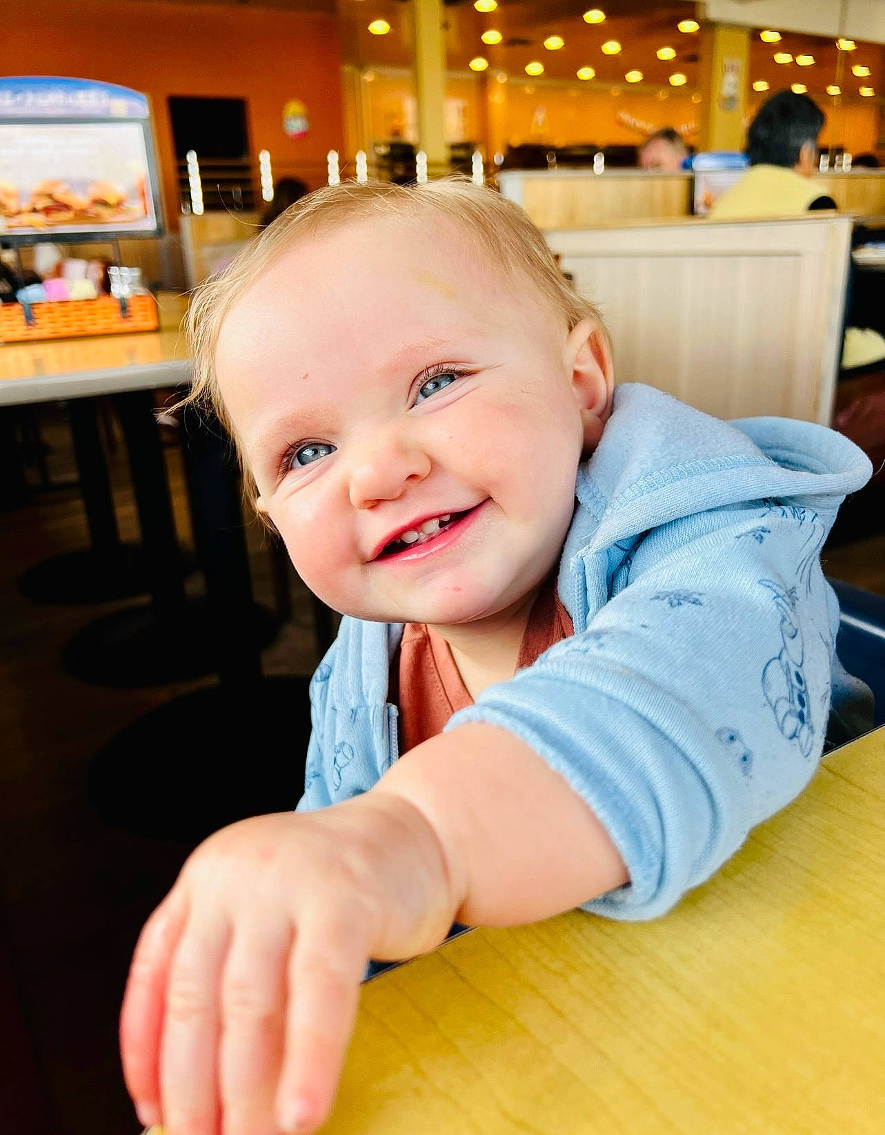 Arizona joined the competition — help win amazing prizes! baby, baby_toddler_clothing, chair, cheek, child, floor, flooring, fun, happy, hardwood, joy, leisure, person, sitting, skin, sleeve, smile, table, thumb, toddler