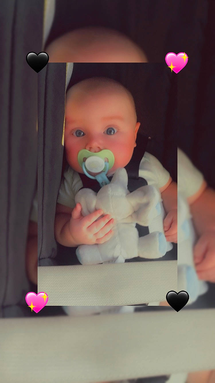 Devan is registered to the contest to win money with this photo: baby, baby_products, baby_safety, baby_toddler_clothing, cheek, eye, eyelash, finger, fun, happy, head, lighting, mouth, nose, organ, person, pink, room, skin, thumb
