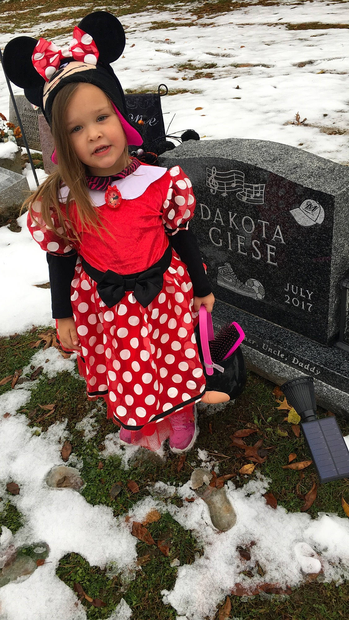 Kinsley is registered to the contest to win money with this photo: child, freezing, headgear, person, pink, plant, play, precipitation, smile, snow, toddler, winter