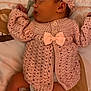 Alayna Kate joined the competition — help win amazing prizes! baby, newborn, sleeping, knitted_cardigan, headband, bow, blanket, nursery, floral_pattern, infant, diaper, legs, hands, ears, face, cute, pink, cozy, portrait, soft_lighting