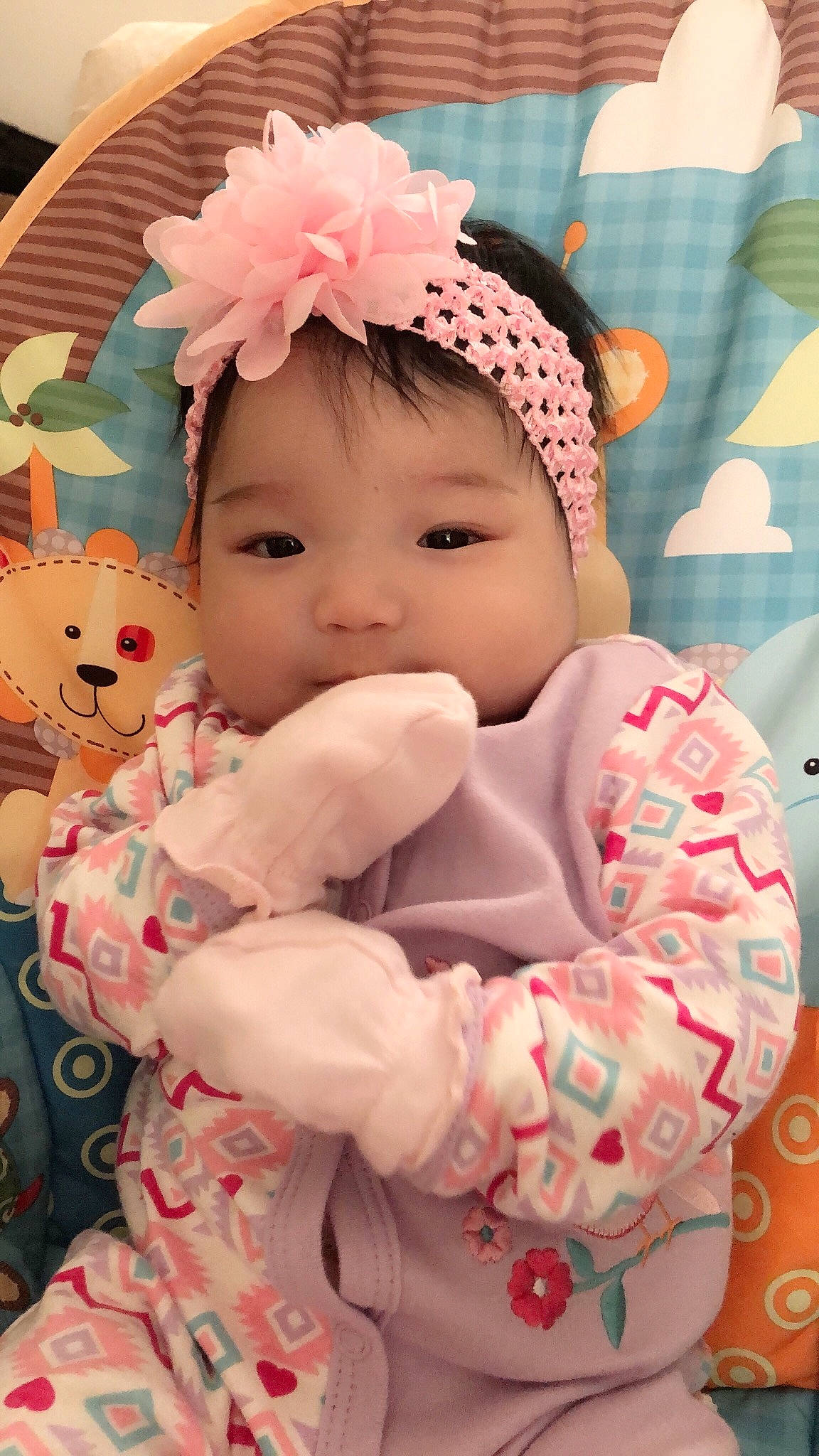 Isabella is registered to the contest to win money with this photo: baby, cheek, child, hair_accessory, headgear, joy, person, pink, toddler