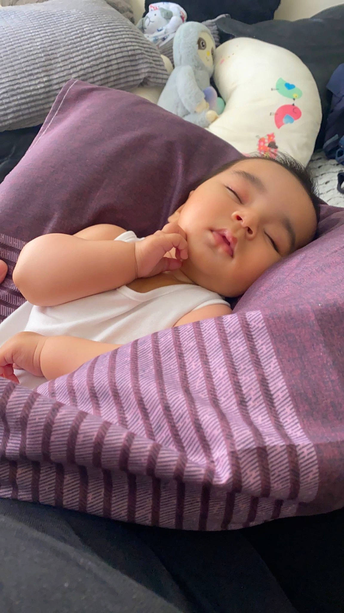 Shan Valentine joined the competition — help win amazing prizes! baby, baby_toddler_clothing, cheek, child, comfort, elbow, hat, human_leg, linens, lip, magenta, pattern, person, pink, plaid, purple, sitting, skin, sleeve, thigh