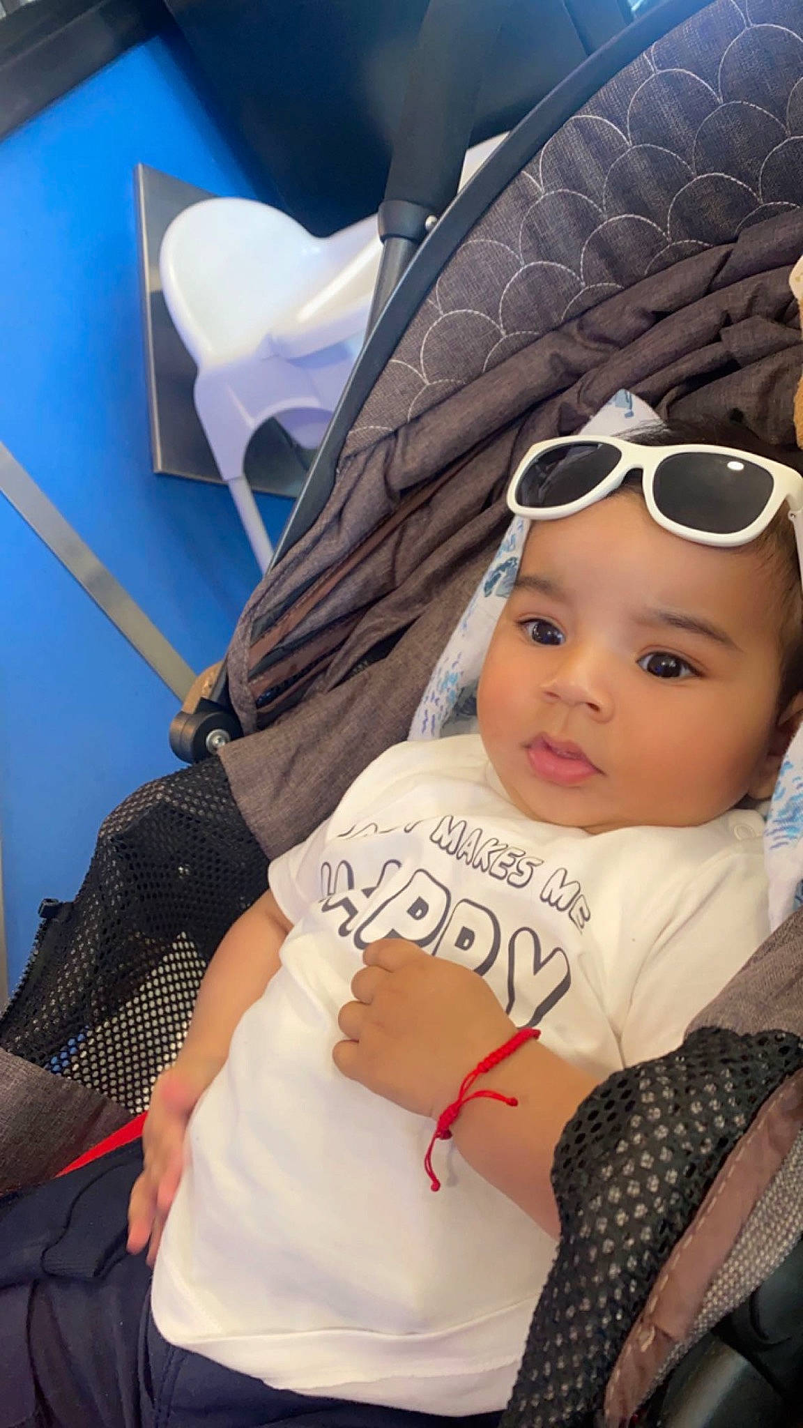 Shan Valentine is registered to the contest to win money with this photo: baby, baby_carriage, baby_products, baby_toddler_clothing, baseball_cap, cap, child, cool, eye, eyewear, fashion_accessory, fun, glasses, goggles, happy, hat, headwear, person, personal_protective_equipment, sunglasses