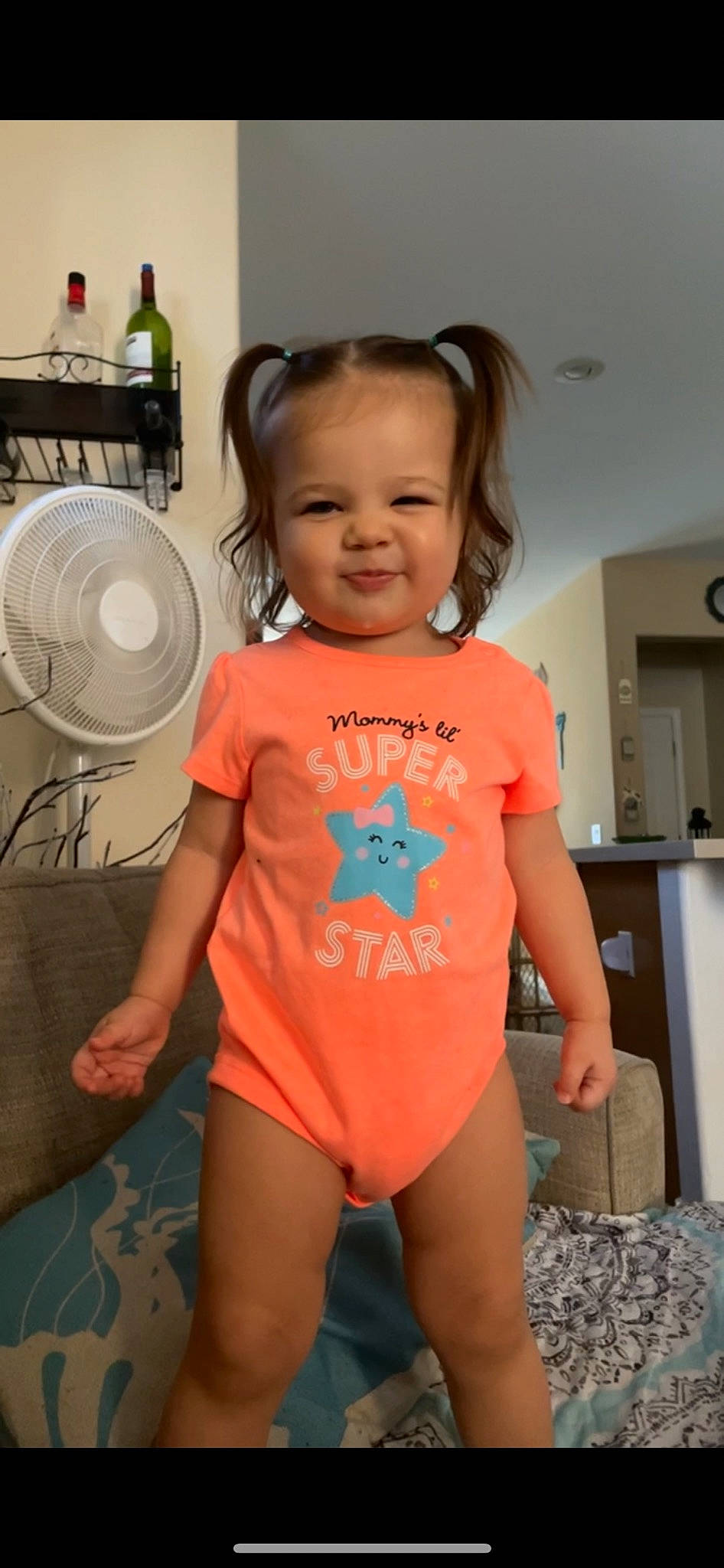 Kataleya is registered to the contest to win money with this photo: baby_toddler_clothing, child, electric_blue, fun, hair, happy, home_appliance, human_body, human_leg, joint, joy, knee, person, shoulder, sleeve, smile, sportswear, t_shirt, thigh, toddler