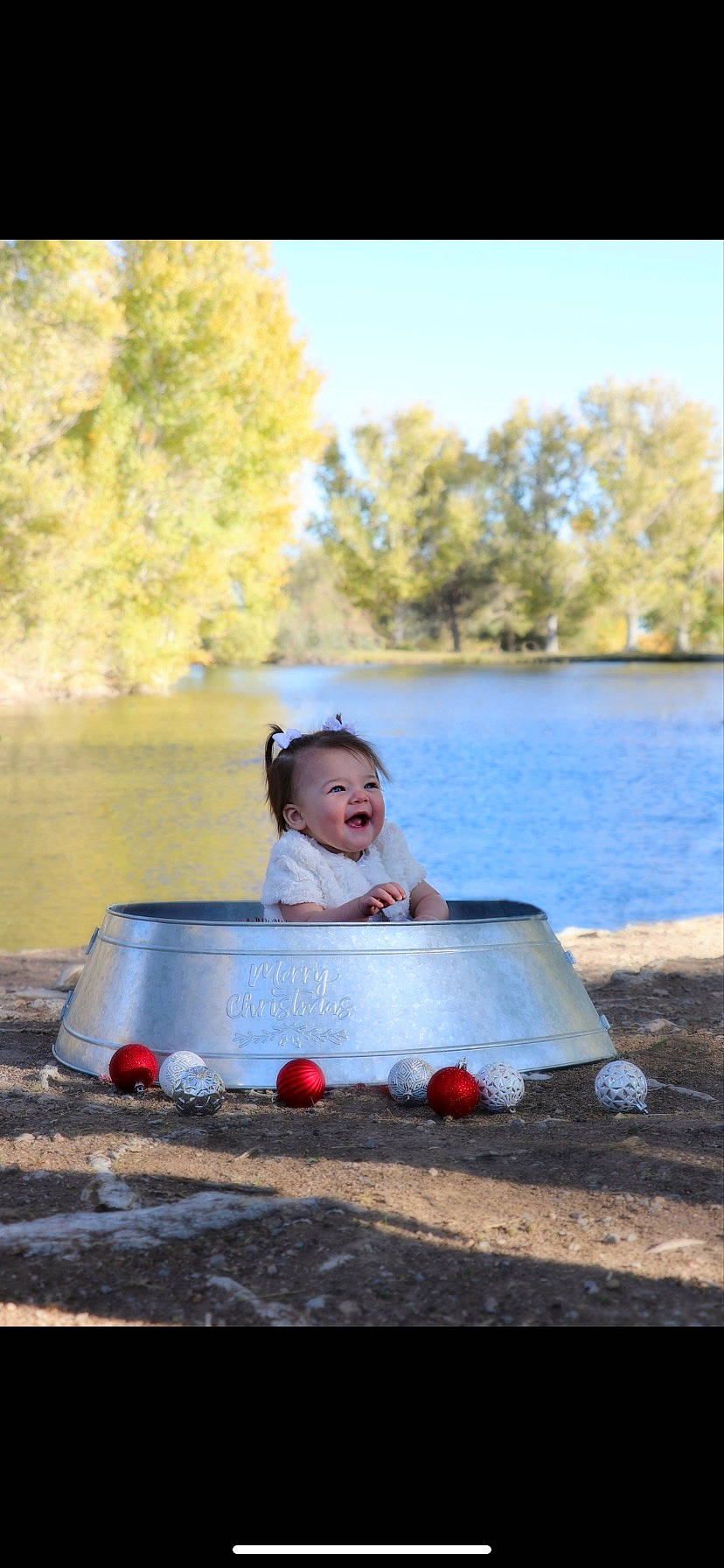 Kataleya is registered to the contest to win money with this photo: bank, flash_photography, fun, grass, happy, lake, landscape, leaf, leisure, nature, people_in_nature, person, plant, recreation, sky, standing, sunlight, toddler, travel, tree