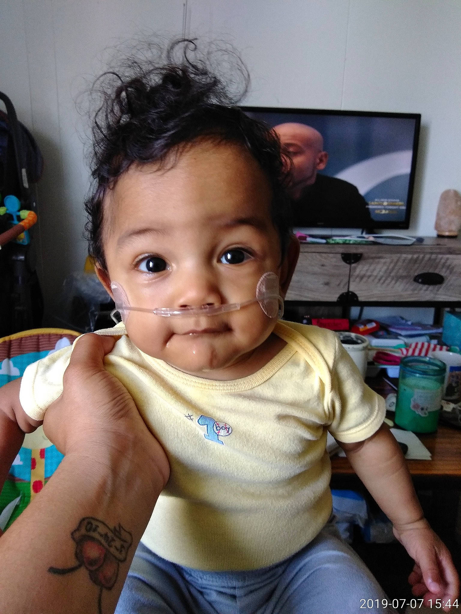 Maurice is registered to the contest to win money with this photo: abdomen, arm, baby, cheek, child, ear, face, finger, forehead, hand, head, lip, mouth, neck, nose, person, skin, smile, toddler