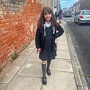 Nectaria is registered to the contest to win money with this photo: accessories, bag, car, clothing, coat, face, female, footwear, girl, hair, handbag, head, lady, person, shoe, standing, teen, transportation, truck, vehicle