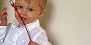 Elijah joined the competition — help win amazing prizes! accessories, blouse, bodypart, boy, child, clothing, face, finger, formalwear, hand, head, jeans, male, pants, person, photography, portrait, shirt, strap, tie