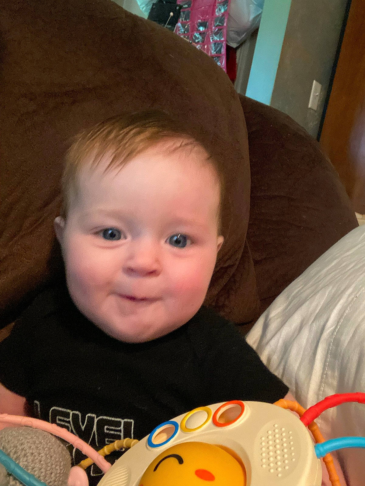 Kyrie is registered to the contest to win money with this photo: baby, baby_playing_with_toys, cheek, child, chin, comfort, eye, eyebrow, face, fun, hair, happy, head, input_device, iris, nose, people, person, skin, smile