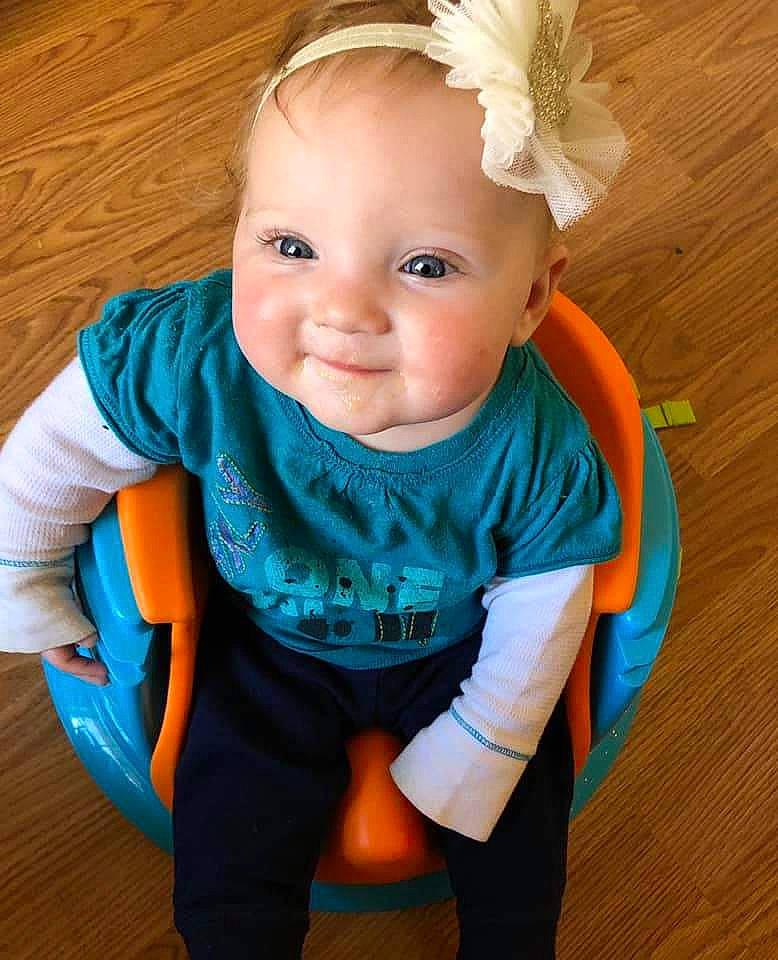 Navaeh joined the competition — help win amazing prizes! baby, baby_products, baby_toddler_clothing, blue, cheek, child, child_model, clothing, fashion_accessory, hair_accessory, head, headband, headgear, person, product, skin, smile, standing, toddler, turquoise