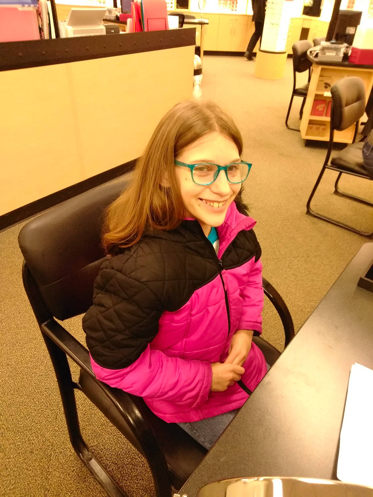Jadyn is registered to the contest to win money with this photo: chair, eyewear, fun, furniture, glasses, joy, person, sitting, vision_care