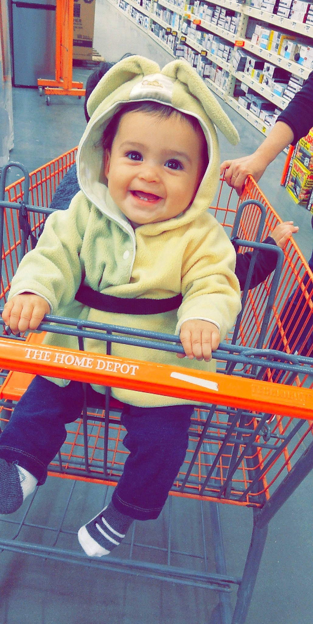 Adalie is registered to the contest to win money with this photo: baby, baby_products, baby_toddler_clothing, blue, child, city, customer, electric_blue, fun, happy, headwear, joy, leisure, person, photograph, product, recreation, shopping_cart, sitting, smile