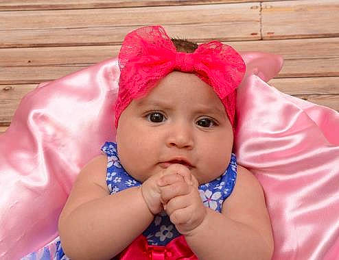 Giana joined the competition — help win amazing prizes! baby, cheek, child, face, fashion_accessory, hair_accessory, hand, head, headgear, lip, mouth, nose, person, photography, pink, play, skin, smile, toddler