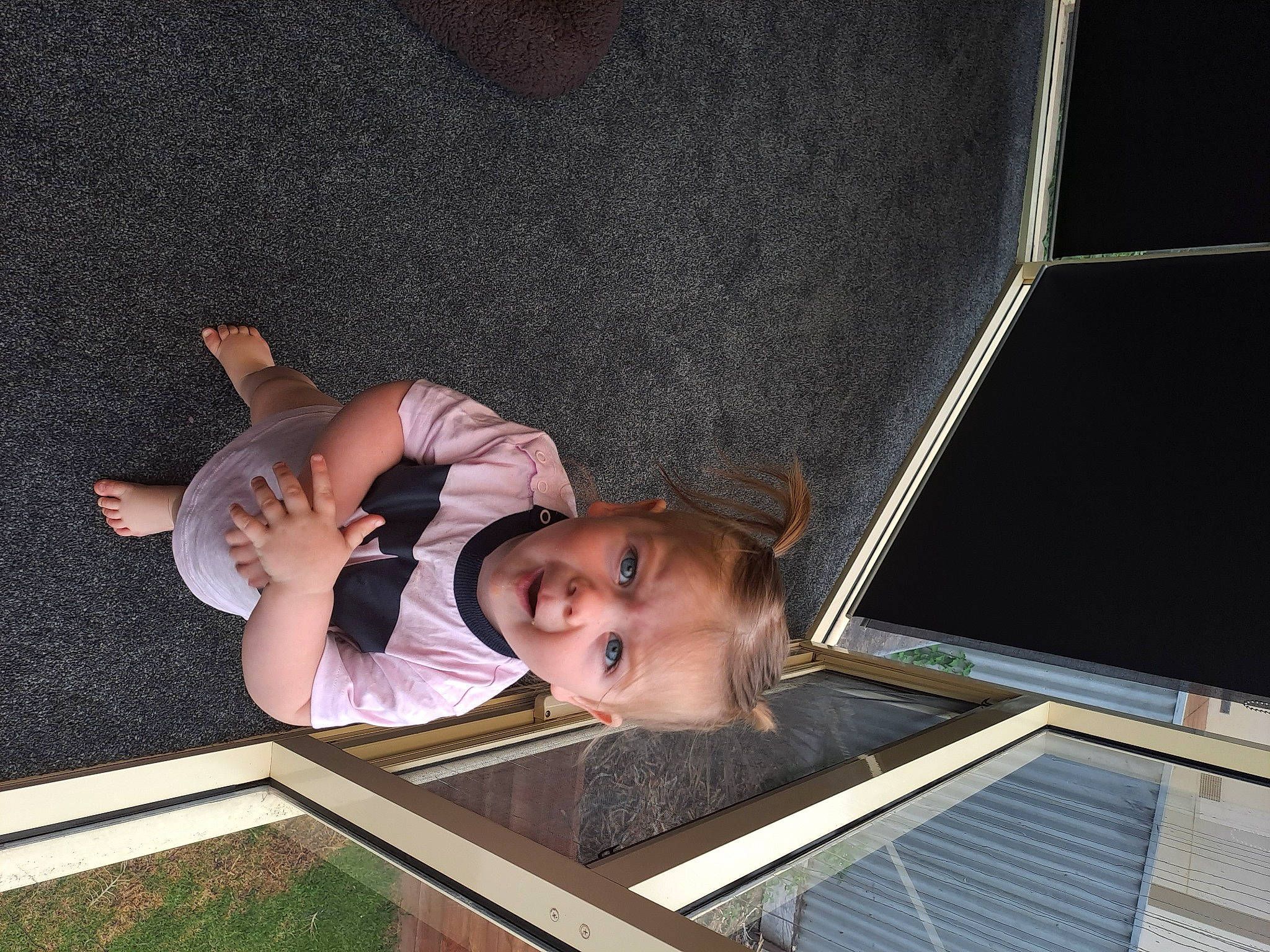 Everly joined the competition — help win amazing prizes! baby_products, child, elbow, fun, gesture, grass, head, leisure, person, space, t_shirt, toddler, tree, wood