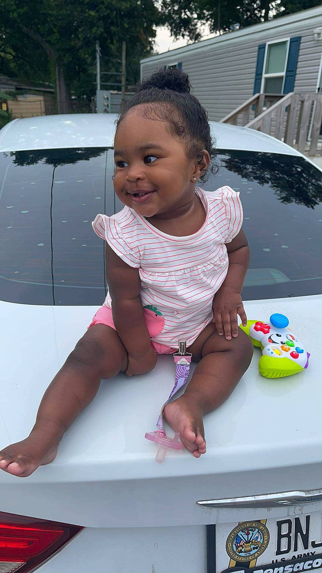 Journi joined the competition — help win amazing prizes! automotive_design, automotive_exterior, baby_toddler_clothing, bumper, car, fun, hairstyle, hand, hood, joy, leg, motor_vehicle, person, pink, shorts, skin, smile, toddler, vehicle, vehicle_door