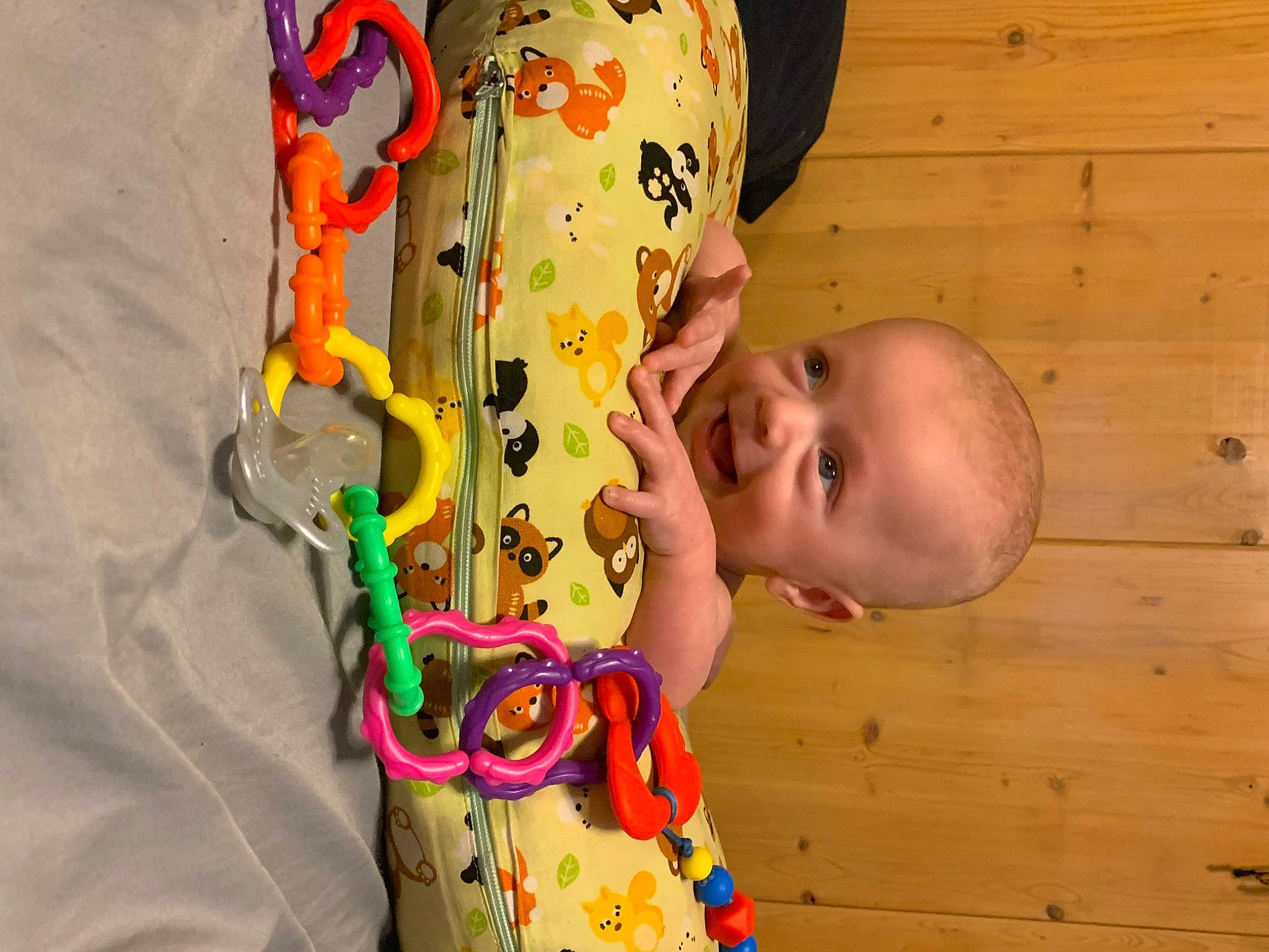 Maurice is registered to the contest to win money with this photo: art, baby, baby_products, baby_toddler_clothing, cheek, child, chin, face, fun, happy, hardwood, head, nose, pattern, people, person, play, room, smile, toddler