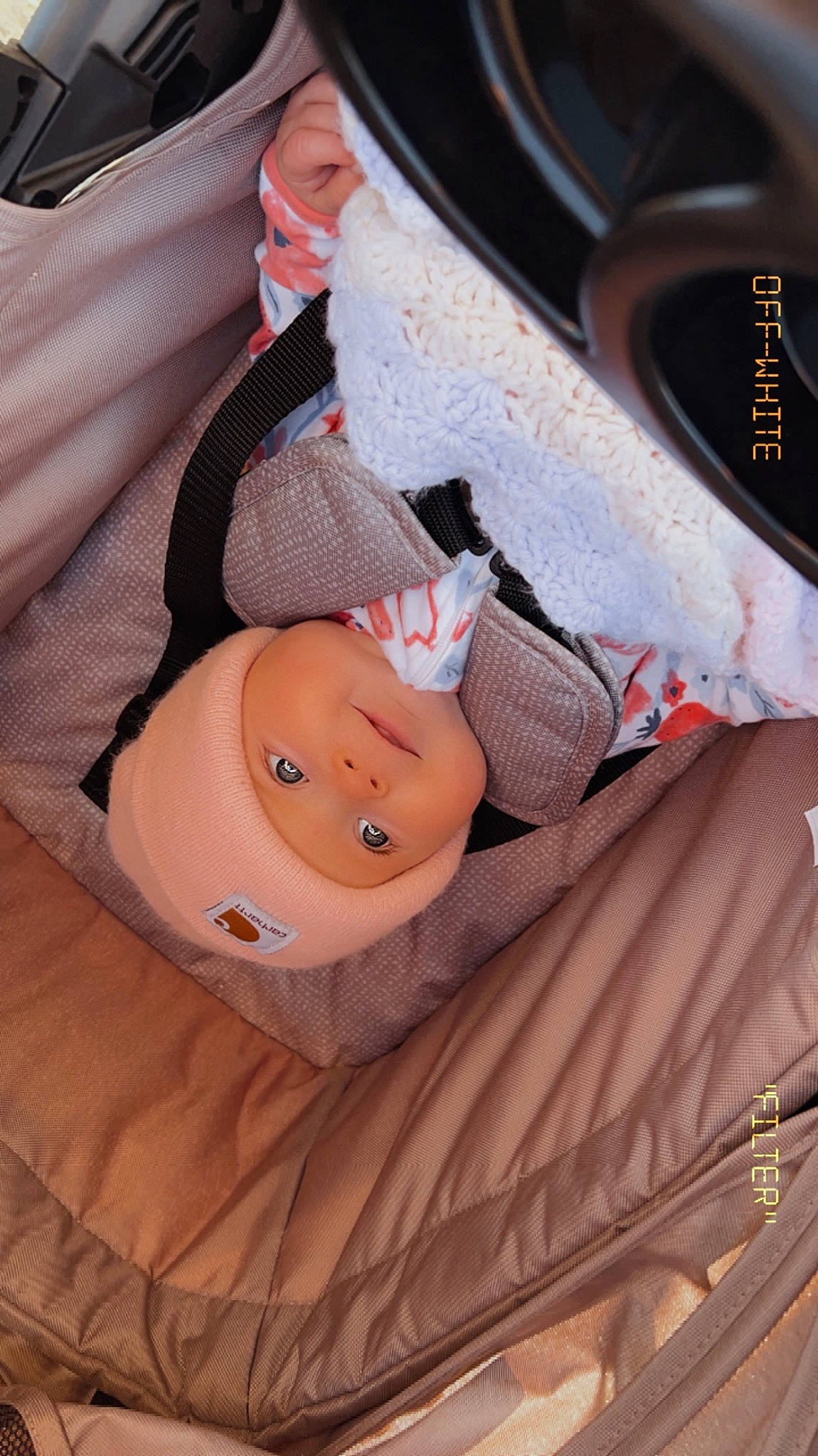 Willow is registered to the contest to win money with this photo: auto_part, automotive_design, automotive_exterior, automotive_lighting, automotive_tire, automotive_wheel_system, baby, car, car_seat, car_seat_cover, child, comfort, hat, headwear, motor_vehicle, nail, person, personal_luxury_car, steering_wheel, textile