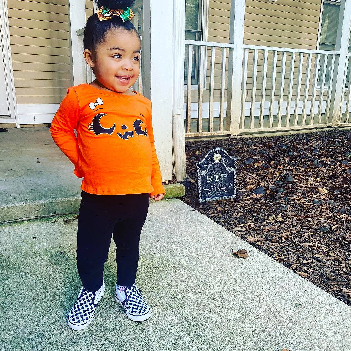 Celine is registered to the contest to win money with this photo: baby_toddler_clothing, chin, clothing, cool, electric_blue, eye, face, fence, footwear, hair, happy, human_body, joy, person, shoe, sleeve, smile, sportswear, standing, street_fashion