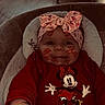 Daiana a rejoint le concours — aidez-le/la à gagner de superbes lots ! baby, bow, child, clothing, cozy, cushion, cute, face, floor, hand, headband, indoor, infant, kiss_marks, minnie_mouse, person, potty, red_sweater, smile, table