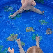 Zalynn joined the competition — help win amazing prizes! baby, child, kiddie_pool, water, splashing, floaties, braided_hair, outdoor, grass, turtle_pattern, blue_pool, playtime, cute, summer, fun, happy, two_children, barefoot, smiling, pavement