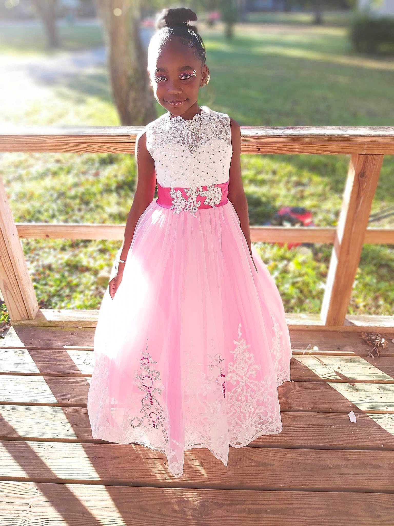 Prisparite joined the competition — help win amazing prizes! bridal_accessory, bridal_clothing, bridal_party_dress, day_dress, dress, embellishment, fashion_design, formal_wear, gown, grass, happy, joy, leisure, long_hair, magenta, one_piece_garment, person, pink, plant, toddler