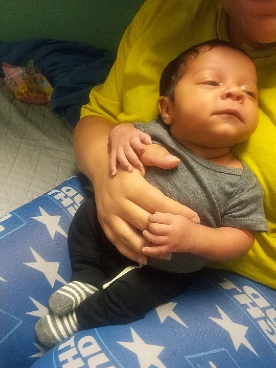 Zayquon joined the competition — help win amazing prizes! baby, chest, comfort, elbow, facial_expression, finger, flooring, gesture, hand, happy, human_body, joint, knee, mouth, nail, person, skin, thigh, thumb, toddler
