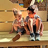 Mateo joined the competition — help win amazing prizes! children, bench, outdoor, sunlight, laughing, shoe, tree, brick_wall, casual_clothing, happy, playful, person, smile, summer, daylight, cute, friends, hair_tie, sneakers, candid