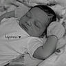 baby, sleeping, blanket, mittens, infant, cozy, soft, black_and_white, portrait, peaceful, cute, child, resting, clothing, newborn, face, hand, lying_down, comfort, toddler