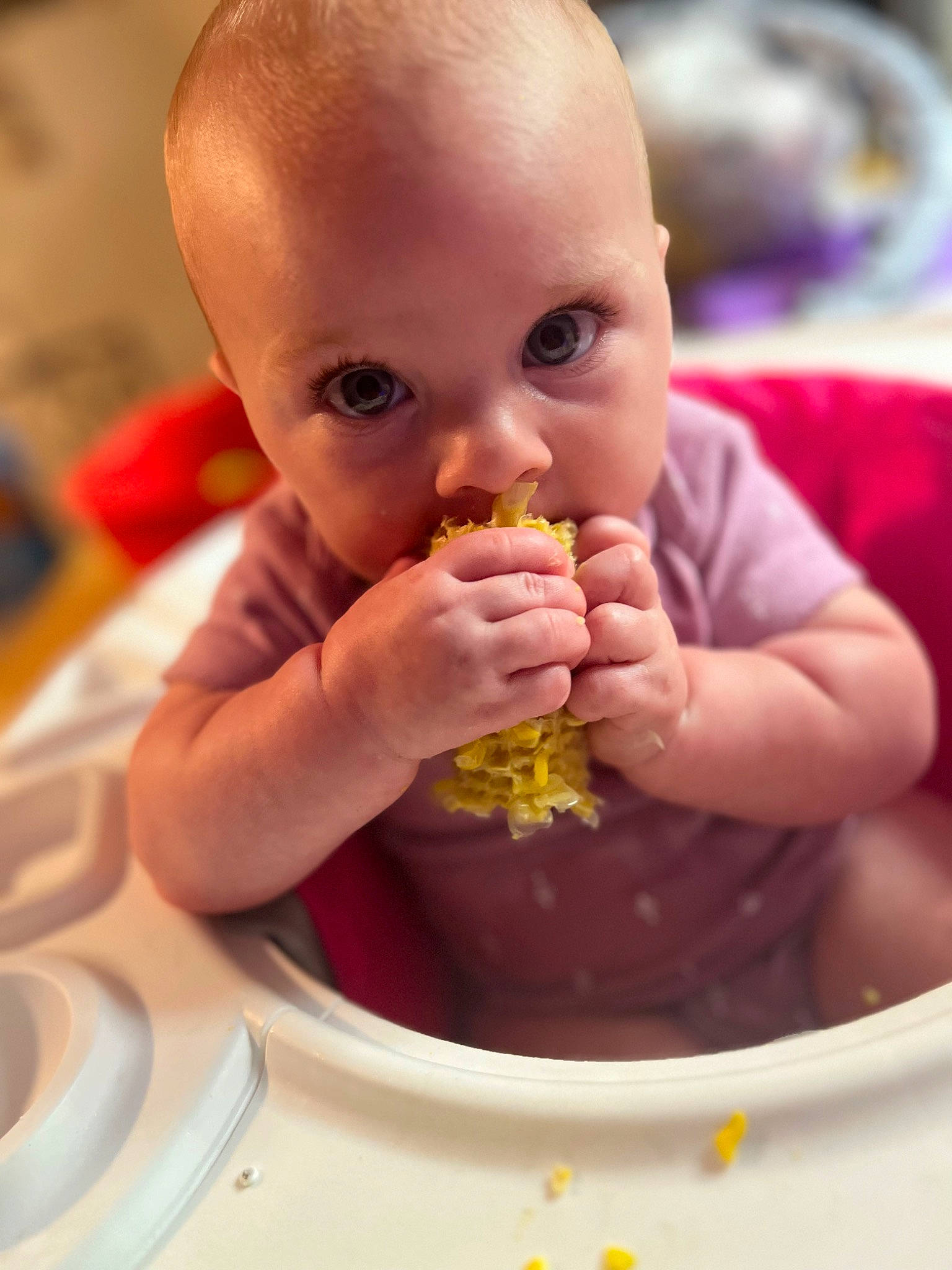 Penelope is registered to the contest to win money with this photo: baby, biting, cheek, child, cuisine, eating, finger, food, food_craving, fun, gesture, hand, happy, lip, mouth, nail, nose, person, sweetness, thumb