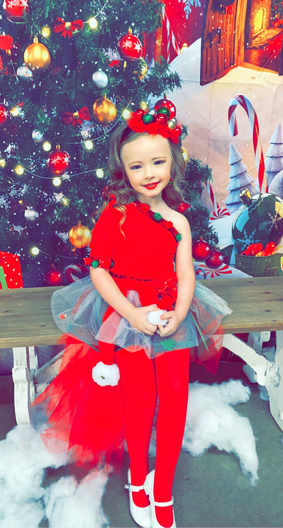Annalee joined the competition — help win amazing prizes! christmas, christmas_decoration, christmas_ornament, christmas_tree, dress, event, flag, fun, happy, hat, holiday, joy, ornament, person, photograph, plant, red, sitting, sleeve, smile