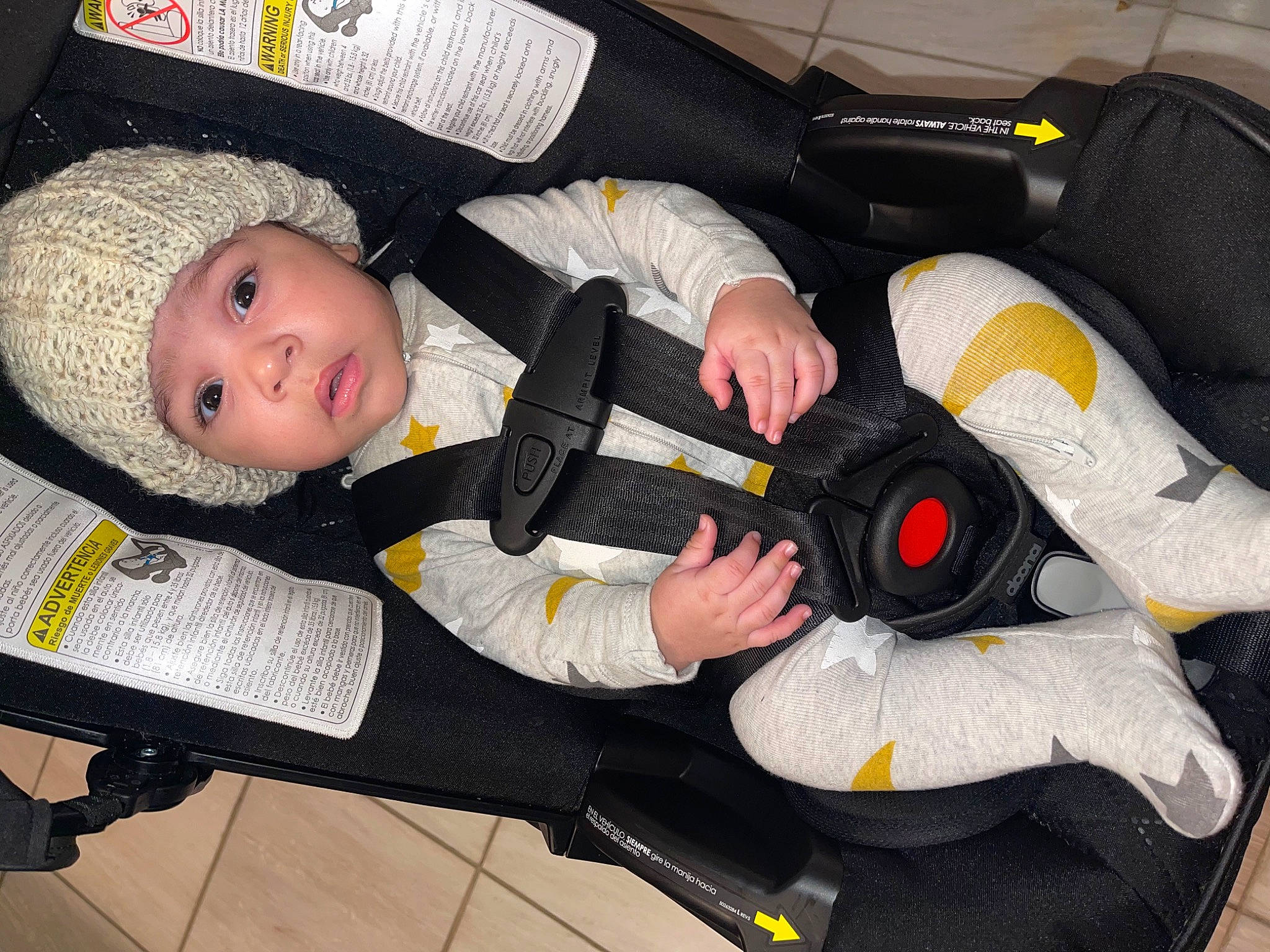 Baby Carlos joined the competition — help win amazing prizes! auto_part, baby, baby_carriage, baby_in_car_seat, baby_products, baby_safety, baby_toddler_clothing, car_seat, child, comfort, headwear, lap, person, product, tire, toddler, vehicle, wheel