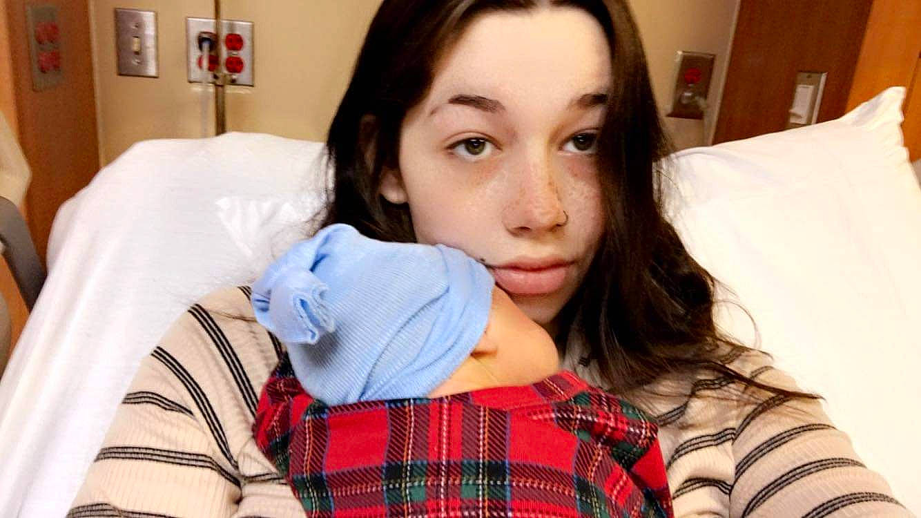 Finnley joined the competition — help win amazing prizes! comfort, couch, electric_blue, eyelash, gesture, happy, linens, lip, long_hair, neck, nose, pattern, person, picture_frame, plaid, shoulder, skin, sleeve, t_shirt, tartan