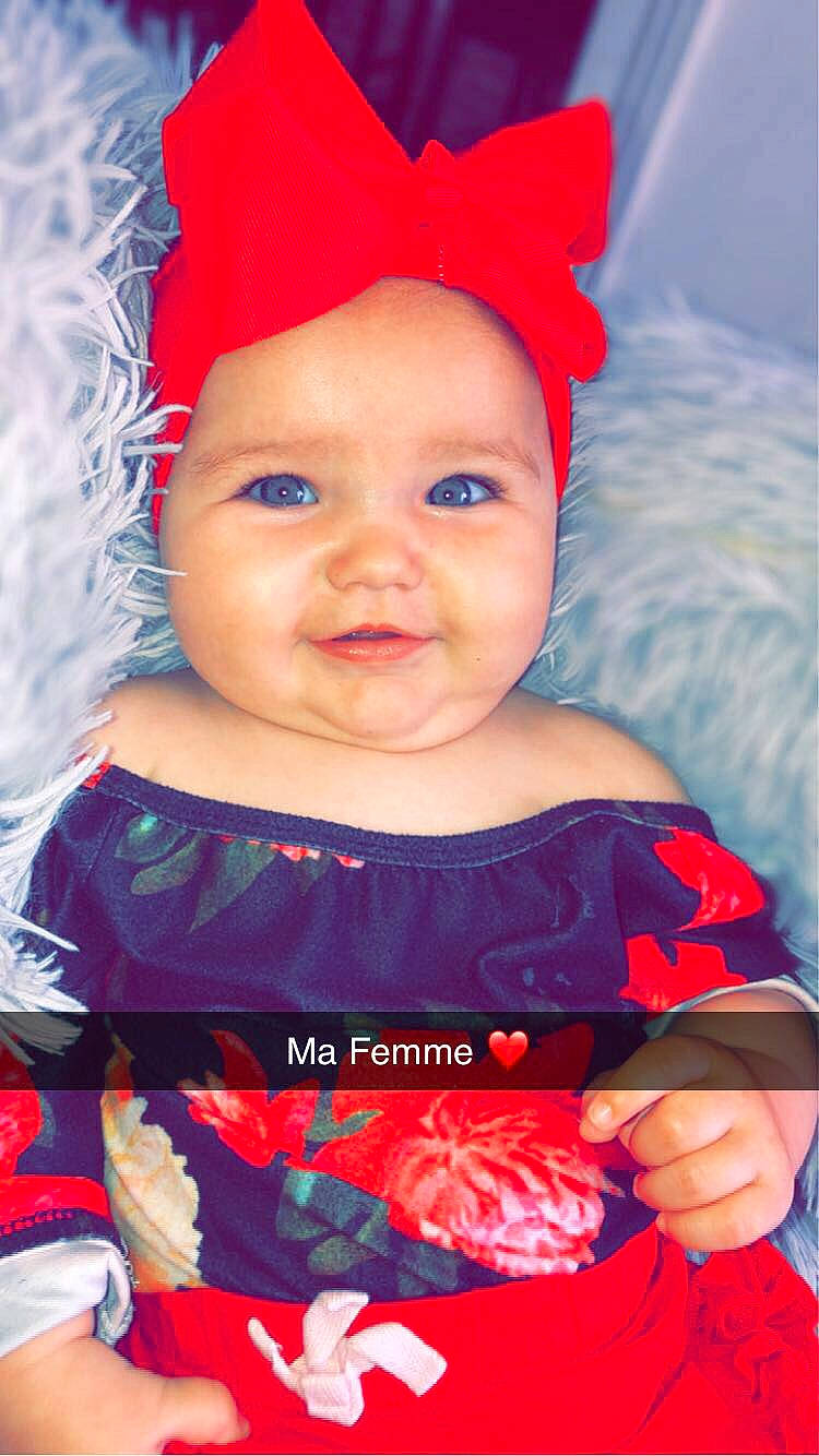 Lyana a rejoint le concours — aidez-le/la à gagner de superbes lots ! baby, baby_toddler_clothing, cap, clothing, costume_hat, dress, electric_blue, face, happy, hat, headgear, headwear, magenta, party_hat, person, pink, product, red, sleeve, smile