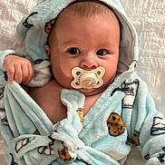 Aksel joined the competition — help win amazing prizes! baby, pacifier, robe, milk, cookie, infant, cute, child, soft, warm, bed, blanket, sleepwear, hood, expression, hand, face, indoors, comfort, portrait