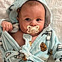 Aksel joined the competition — help win amazing prizes! baby, pacifier, robe, milk, cookie, infant, cute, child, soft, warm, bed, blanket, sleepwear, hood, expression, hand, face, indoors, comfort, portrait