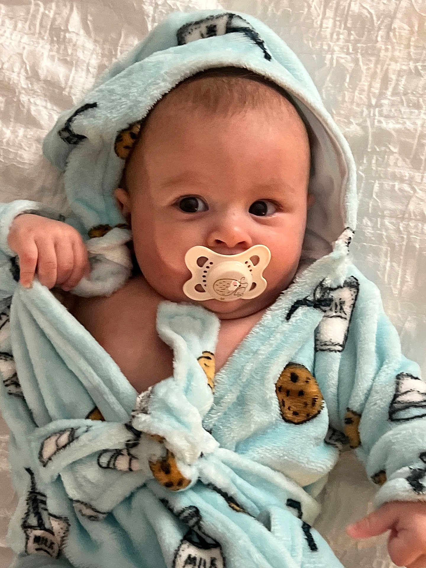 Aksel joined the competition — help win amazing prizes! baby, pacifier, robe, milk, cookie, infant, cute, child, soft, warm, bed, blanket, sleepwear, hood, expression, hand, face, indoors, comfort, portrait