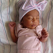 Anayla is registered to the contest to win money with this photo: baby, bed, blanket, bodypart, bonnet, cap, clothing, face, finger, furniture, glove, hand, hat, head, newborn, person, photography, portrait, quilt, sleeping