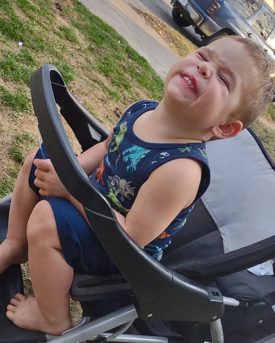 Oliver joined the competition — help win amazing prizes! automotive_exterior, comfort, elbow, eyewear, fun, grass, hairstyle, human_body, joint, knee, land_vehicle, leisure, muscle, person, photograph, recreation, shoulder, smile, summer, thigh