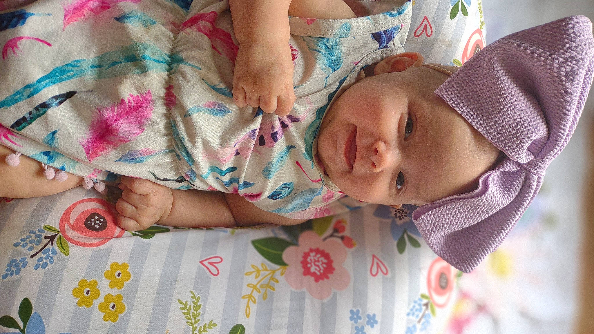 Shyann is registered to the contest to win money with this photo: arm, baby_toddler_clothing, cheek, eye, face, facial_expression, finger, hand, happy, head, headwear, lip, nose, organ, person, pink, product, skin, sleeve, smile