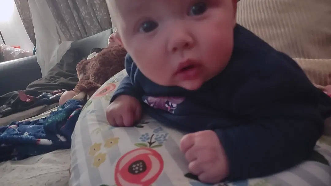 Shyann is registered to the contest to win money with this photo: baby, baby_toddler_clothing, cheek, child, chin, comfort, eye, eyebrow, eyelash, hand, happy, headwear, iris, lip, mammal, mouth, nose, person, product, skin