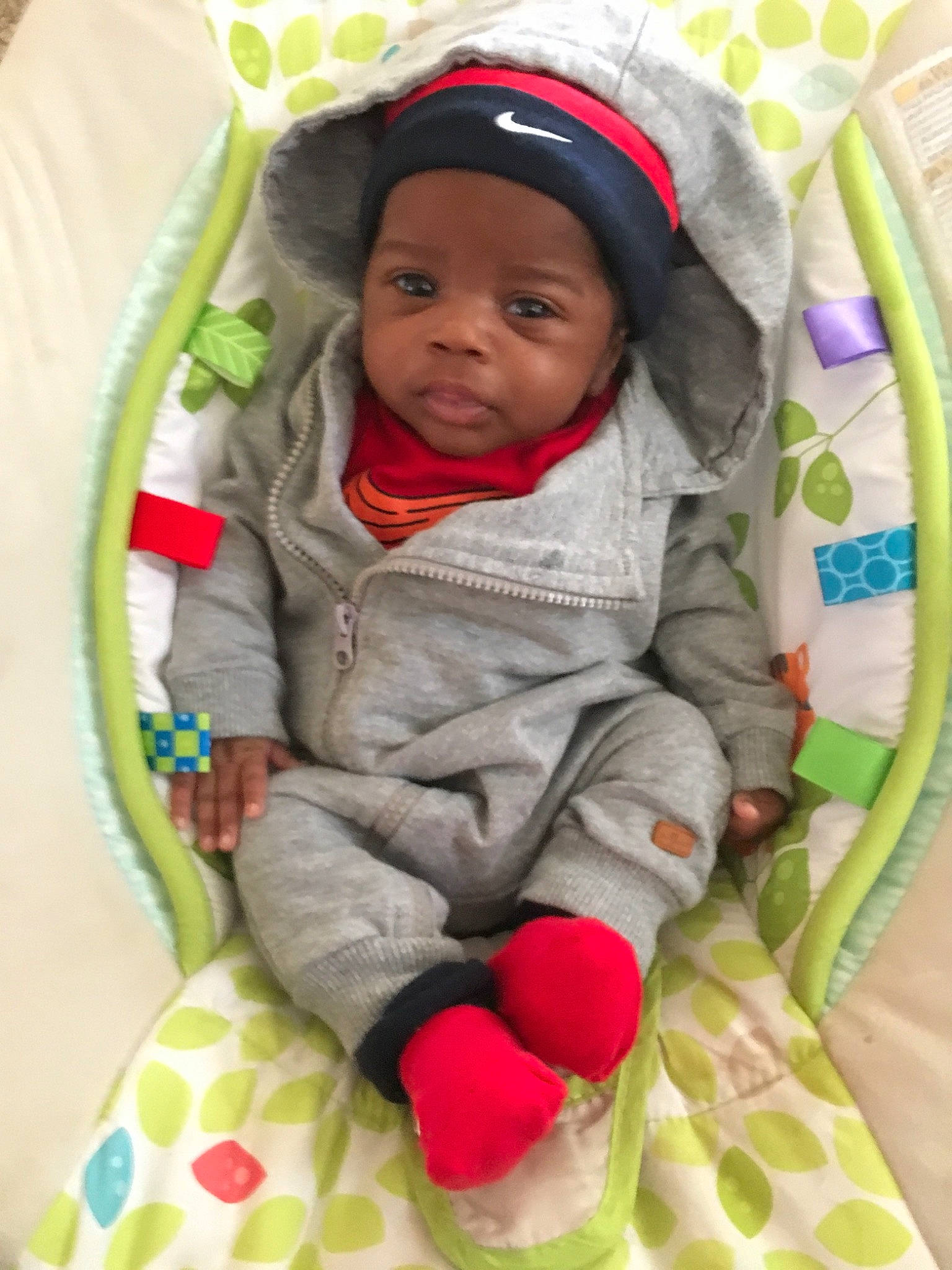 Jakari is registered to the contest to win money with this photo: baby, baby_in_car_seat, baby_products, cheek, child, person, play, product, skin, smile, toddler