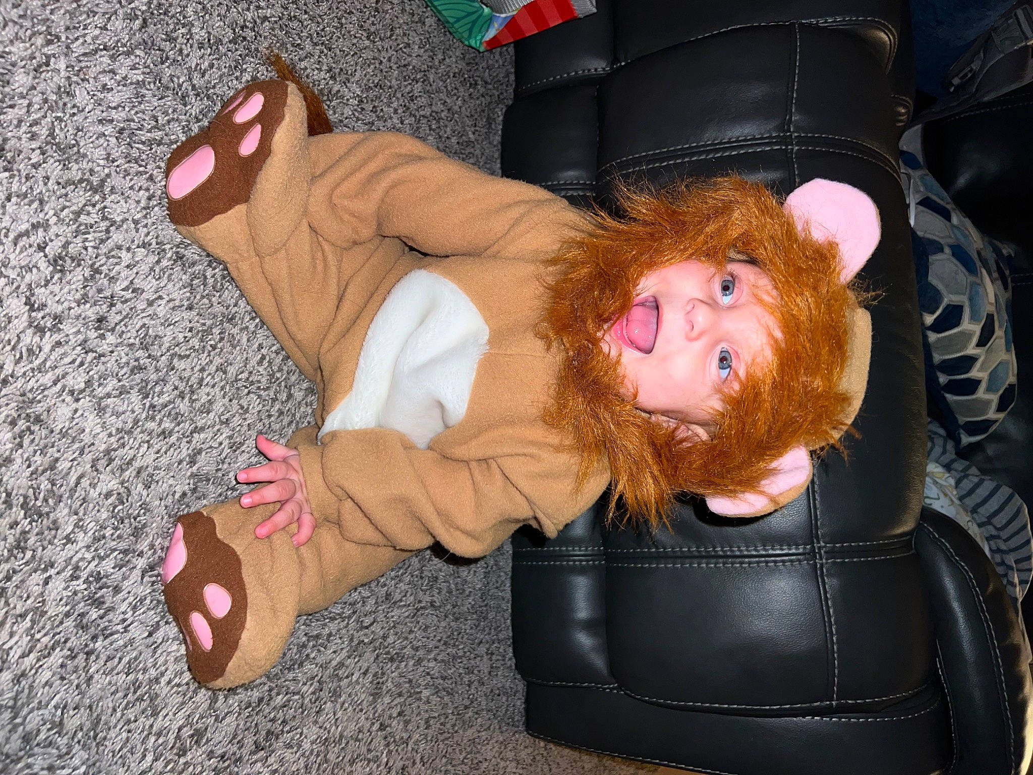 Coen joined the competition — help win amazing prizes! boxing_glove, child, comfort, flooring, foot, fun, fur, glove, hat, headwear, human_body, human_leg, joint, knee, lap, person, personal_protective_equipment, sitting, sock, sunglasses